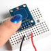 Adafruit Toggle Touch Sensor on Breadboard (not included)